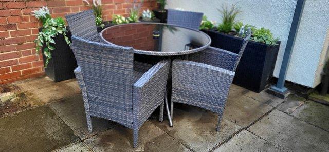 Image 3 of Poly rattan garden table and chairs with parasol and base
