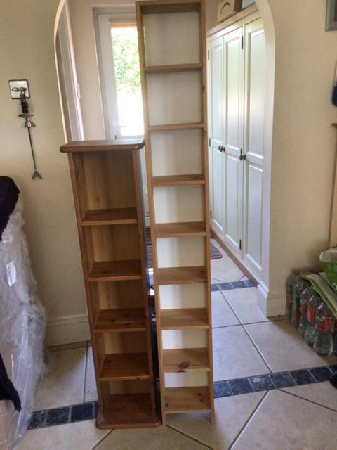 Preview of the first image of Two Wooden CD Racks for storage.