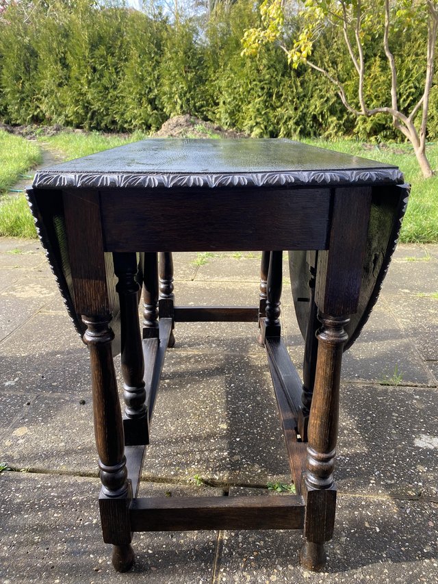 Preview of the first image of Vintage Antique Dark Brown Gate Leg Table & 3 Chairs.