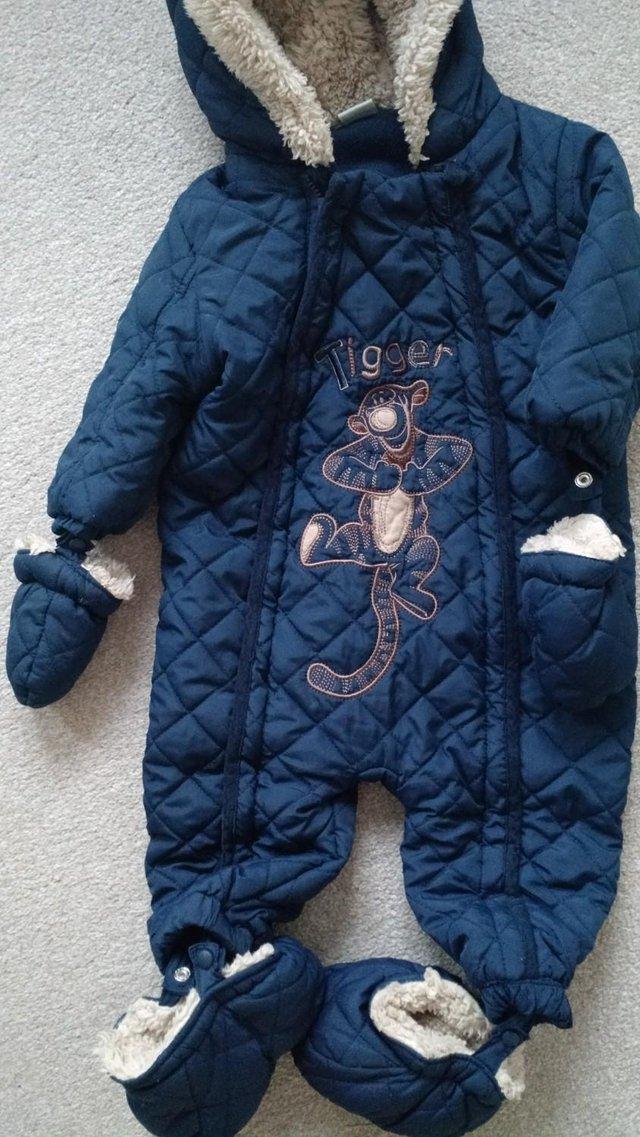 Preview of the first image of Baby pramsuit size 9-12 months navy.