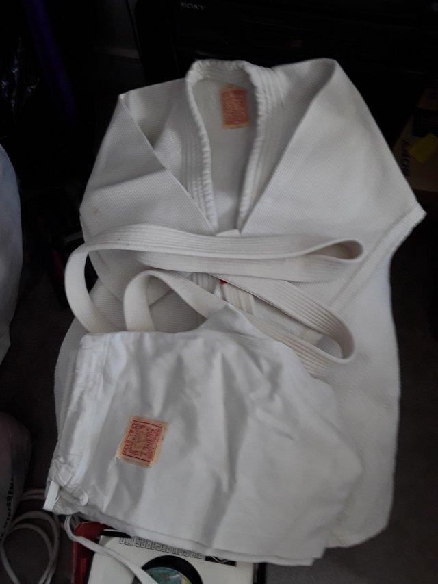 Preview of the first image of Childs judo suit.Childs judo suit size 1 ,good condition..