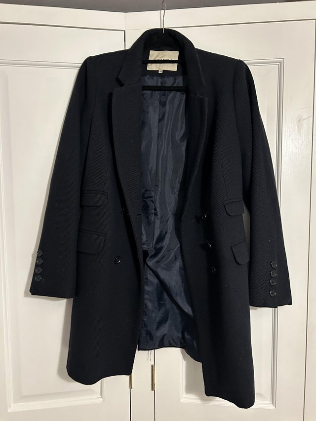 Preview of the first image of Lady’s black blazer jacket.