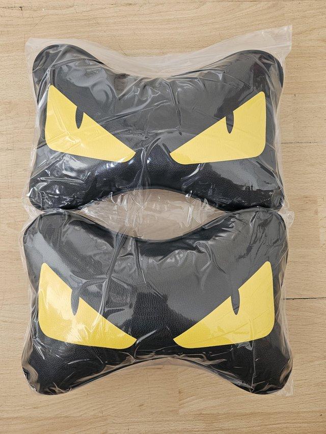 Preview of the first image of Yellow Car Headrest Fendi Neck Pillow Pair Designer Leather.