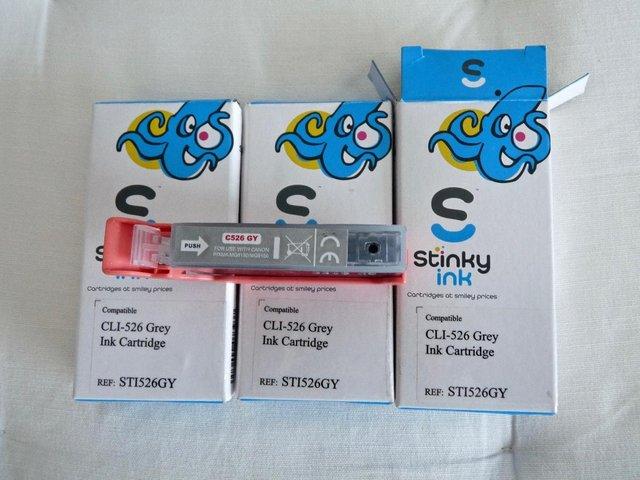 Preview of the first image of THREE CANON COMPATIBLE GREY INK CARTRIDGES.