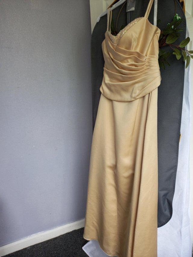 Preview of the first image of Bridesmaid Dress for a Wedding.