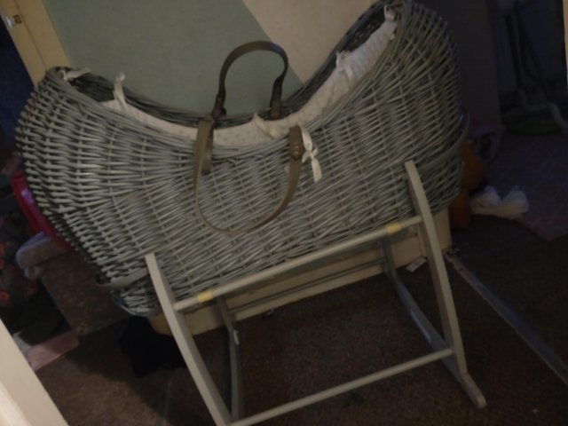 Preview of the first image of Moses basket comes with a rocking stand.