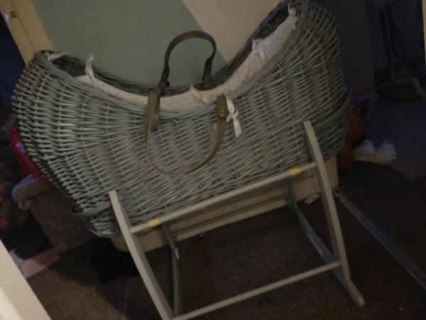 Image 1 of Moses basket comes with a rocking stand