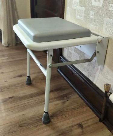 Image 1 of Fold-Away shower seat. Brand new