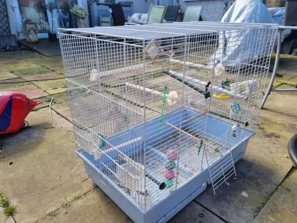 Image 4 of 2 bird cages 1 large 1 small need cleaning both good.