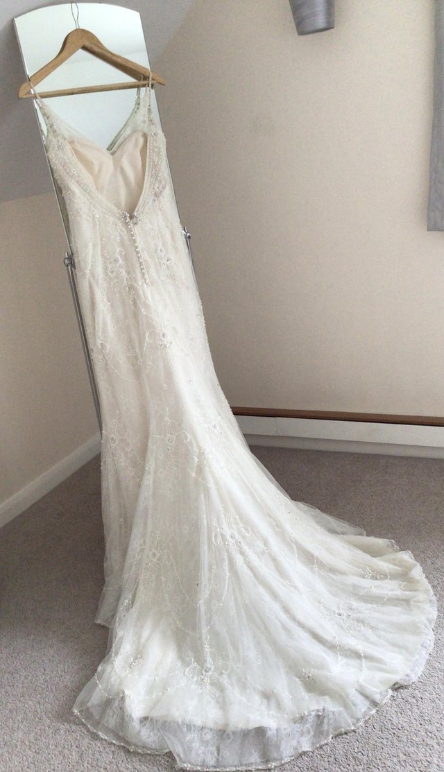 Preview of the first image of Maggie Soretto wedding dress size 10/12.