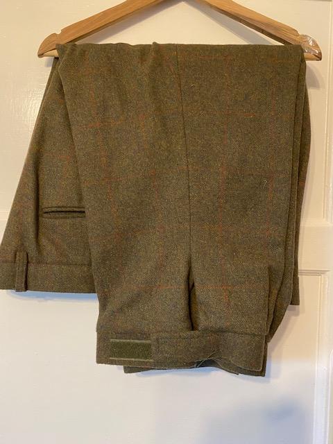 Preview of the first image of tweed shooting breeks with velcro straps.