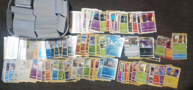 Preview of the first image of Hundreds and hundreds of pokemon cards.