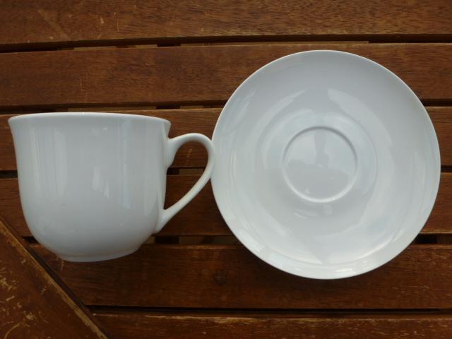 Preview of the first image of Sparkling white fine china cup and saucer.