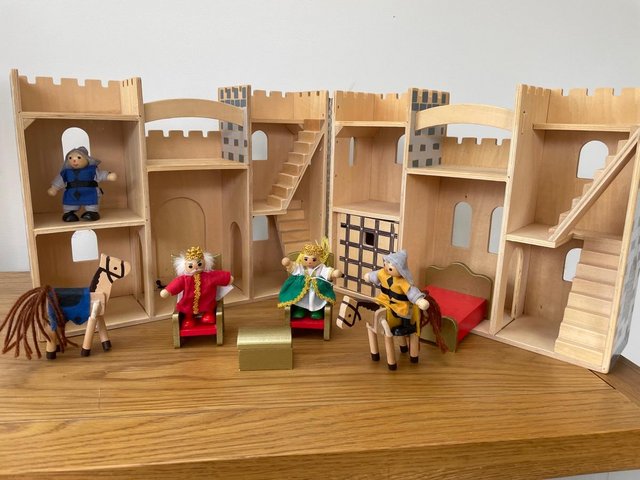 Preview of the first image of Melissa and Doug Fold & Go Wooden Castle.