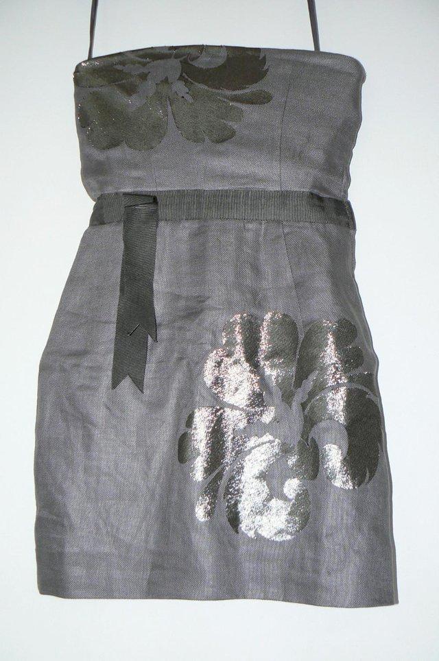 Preview of the first image of Silverdesigner dress by Richard Nicholl size 6.