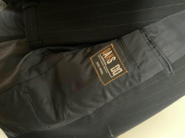 Preview of the first image of Men’s Daks suit, 100 % Wool , purchased but never worn ..