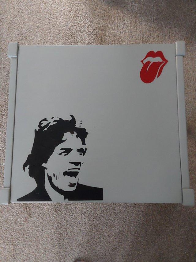 Preview of the first image of Upcycled Mick Jagger Stones side / occasional table.