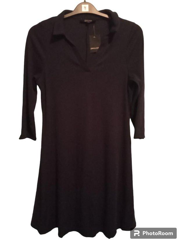 Preview of the first image of Open Shirt Collar Ribbed A-Line Dress.