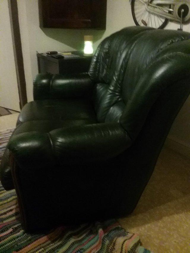 Preview of the first image of TWO SEATER GREEN LEATHER,in good condition.