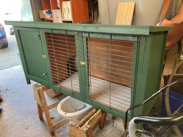Image 1 of Rabbit Hutch for sale. Plywood construction with felt roof.
