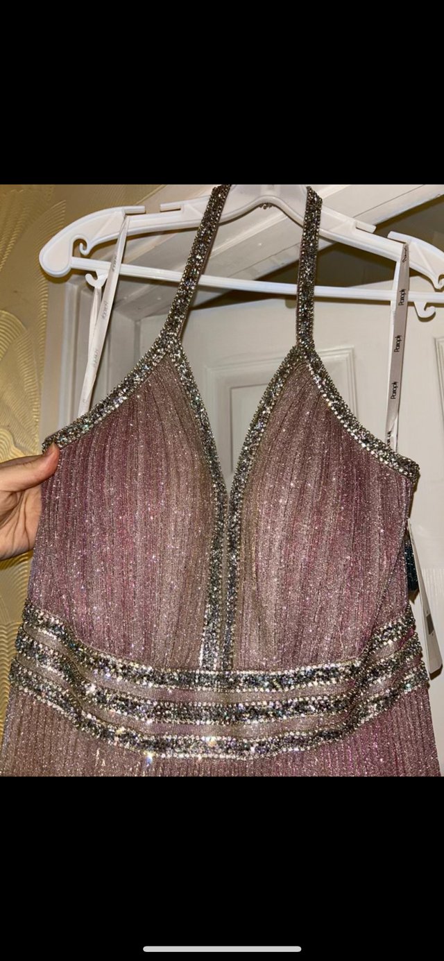 Preview of the first image of Pink glittery prom dress.