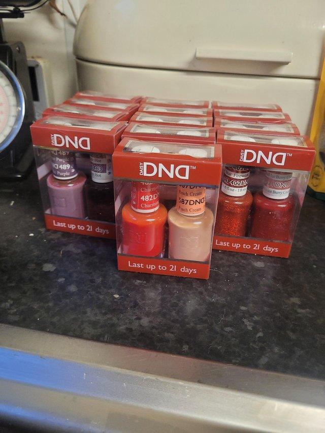 Preview of the first image of 18 bottles of Daisy DND gel nail polish unopened.