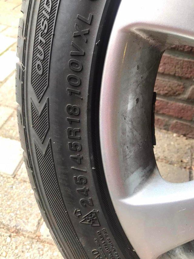 Preview of the first image of 4 x 18” 7 Spoke Alloy Wheels with 245/45/18 winter tyres.