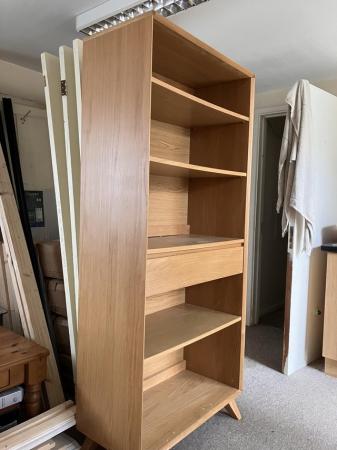 Image 2 of Upright wooden bookcase with shelves and a hidden drawer