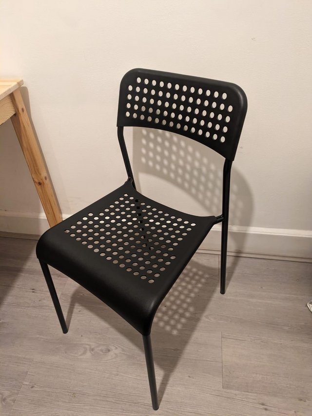 Preview of the first image of IKEA black chairs (× 4 chairs).