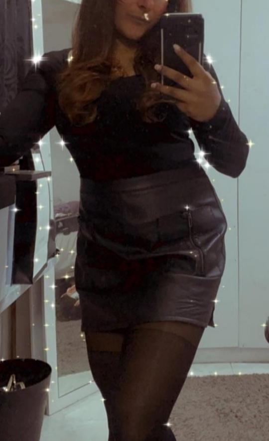 Preview of the first image of Fake leather mini skirt . Size 10..