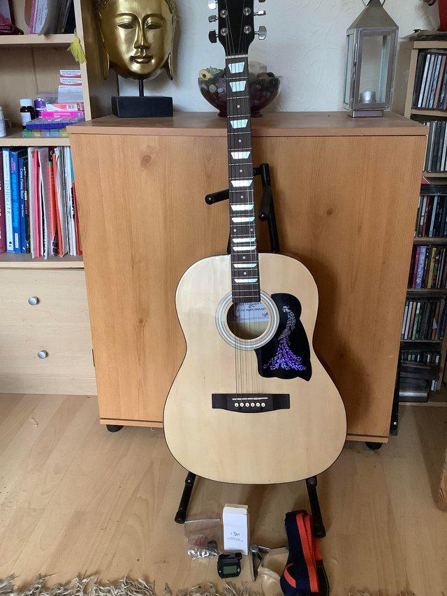 Preview of the first image of Acoustic guitar lovely condition ,Martin Smith.