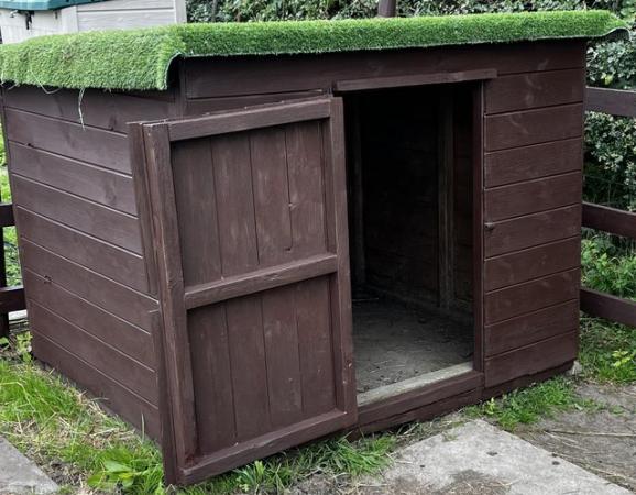 Image 1 of 51 x 59 inch brown wooden shed