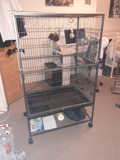 Preview of the first image of Large bird cage nearly new and new accessories..