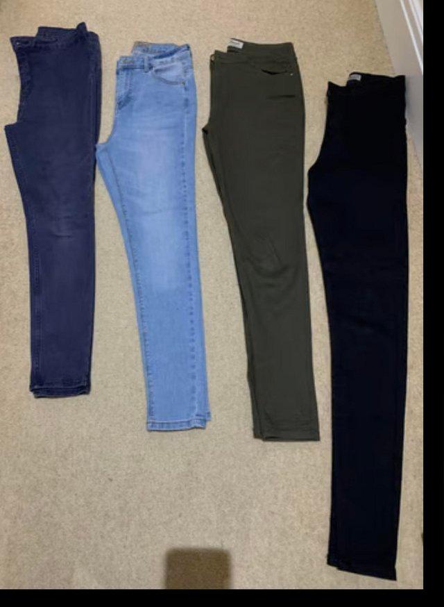 Preview of the first image of Young lady trousers denim and others.