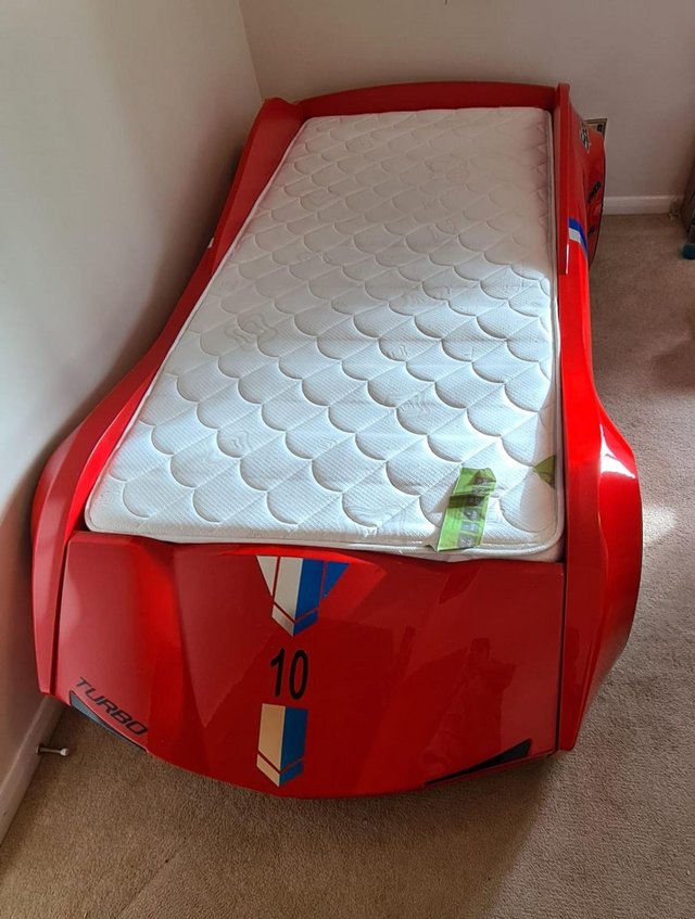 Preview of the first image of Car Bed - Comes with mattress - Accepting offers.
