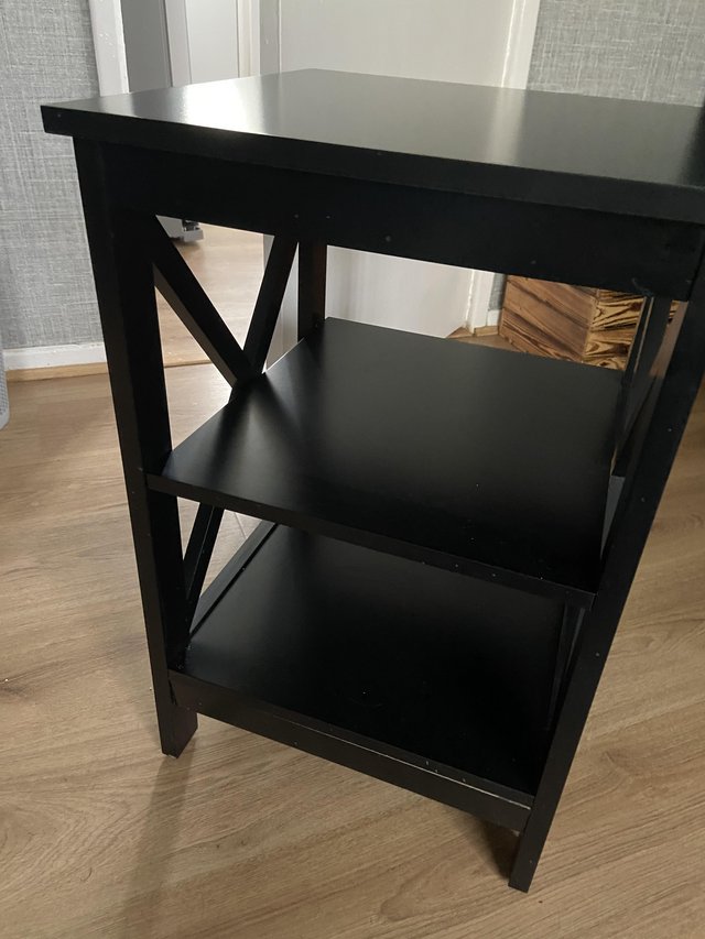 Preview of the first image of Black side table with two shelves.