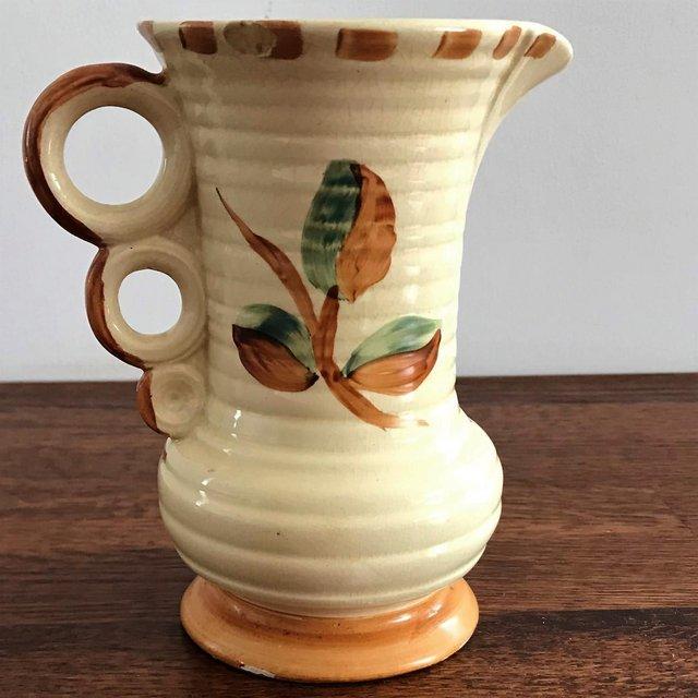 Preview of the first image of Vintage Wadeheath Ware, England jug. Well loved!.
