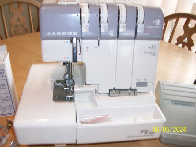Preview of the first image of JANOME Overlocker sewing machine.