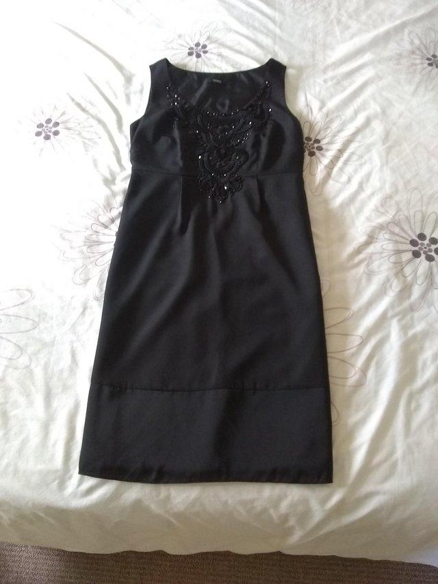 Preview of the first image of Black Party/going out dress with beautifulbeaded detailil.