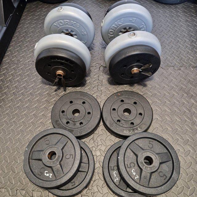 Preview of the first image of Adjustable dumbbells and weights.