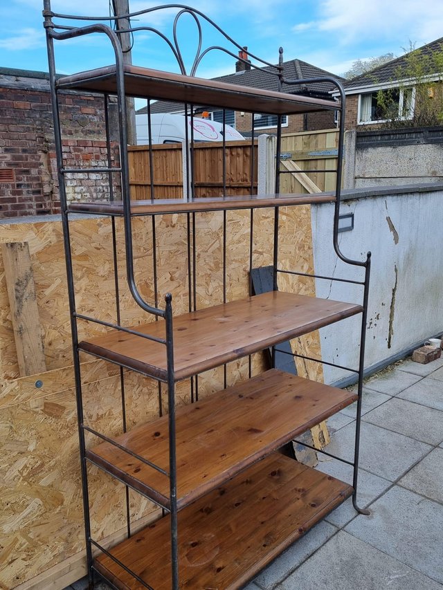 Preview of the first image of Antique wrought iron and solid wood baker's rack.
