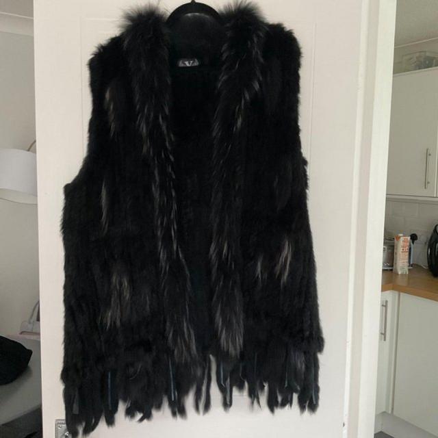 Preview of the first image of Black real fur waistcoat.