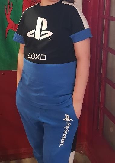 Preview of the first image of Playstation trousers and top set in blue.