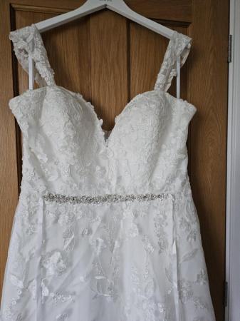 Image 1 of Wedding Dress with long trane