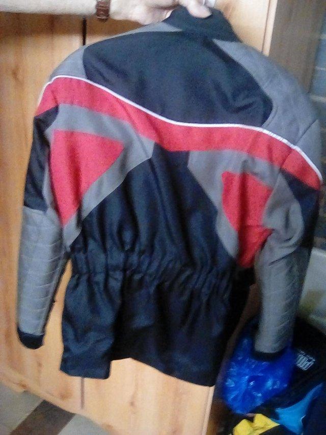 Preview of the first image of Ladies PROTO riding jacket multi colour.