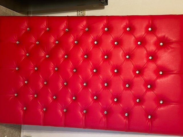 Preview of the first image of Red faux leather headboard.