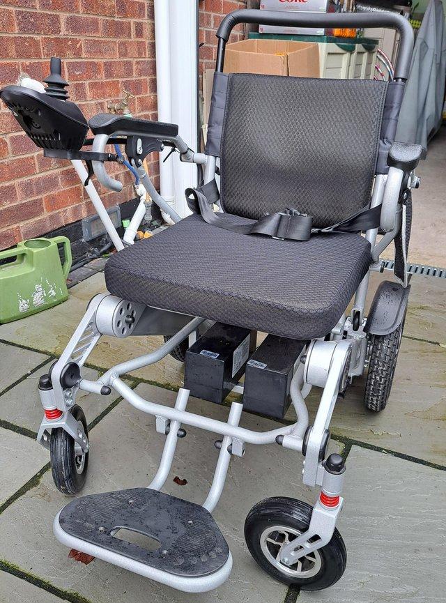 Preview of the first image of Mobility Plus Lightweight, Foldable, Electric Wheelchair.