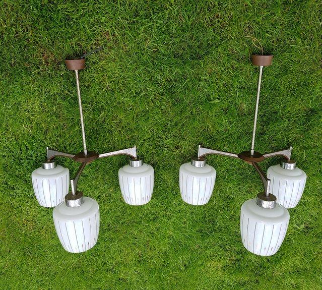 Preview of the first image of vintage mid century pair chrome teak & glass pendant lights.