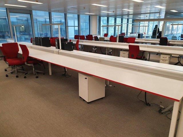 Preview of the first image of Extra large White 8-pod office bench hot desks/tables.