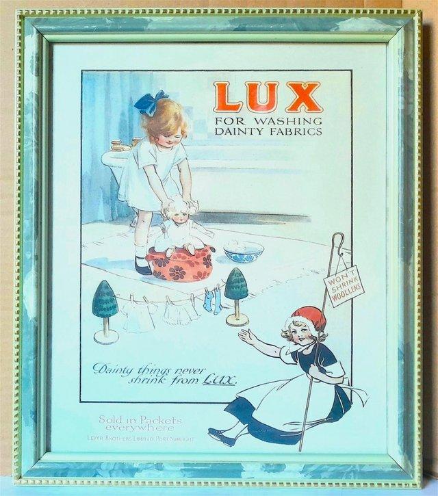 Preview of the first image of FRAMED PRINT OF A LUX ADVERT under glass.